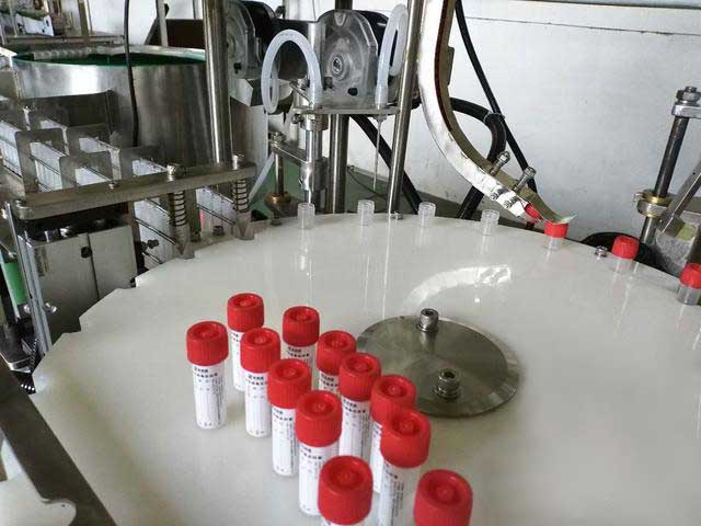 生化免疫化学试剂灌装封口机 机器人试剂灌装生产线
